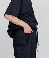 UNTRACE "TECH WOOL SUPER TAPERED CUFFS PANTS"