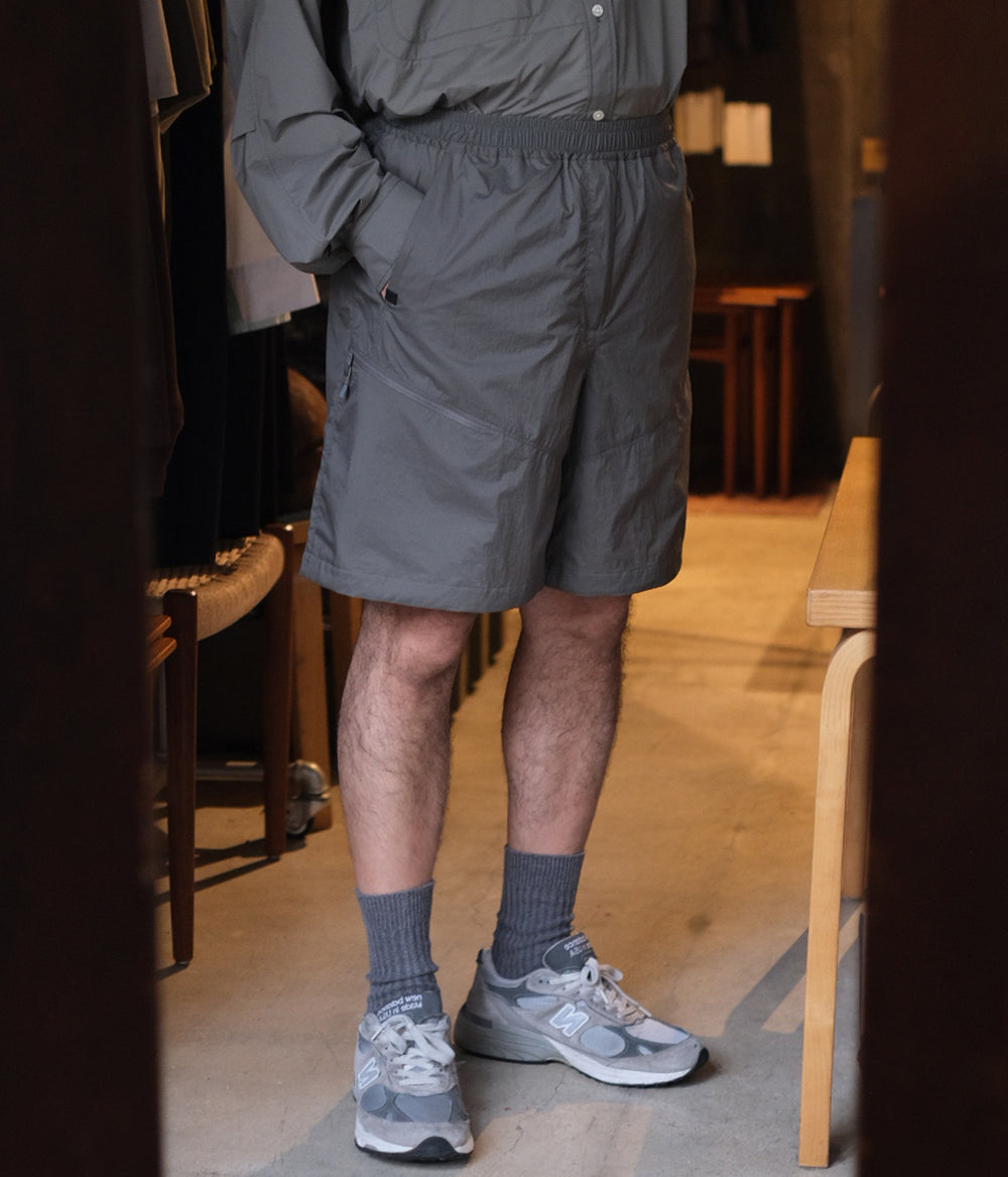 さつきDAIWAPIER39 TECH WIND SHELL SHORTS Tech Wind Shell Shorts - Wolfgray | UP THERE